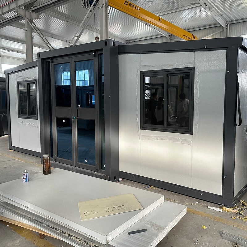 서비스 라이프 15-30 년 스틸 샌드위치 패널 20 피트 30 피트 40 피트 휴대용 모듈 확장 가능한 컨테이너 하우스 2 침실